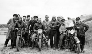 Winnipeg-Roughriders-Motorcycle-Club vintage image of 16 post WW2 guys and their 3 motorcycles