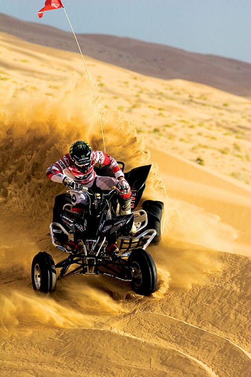 ATV rider in sand dunes