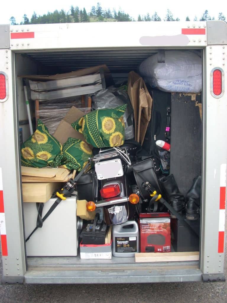 Motorcycle stuffed in a small rental trailer